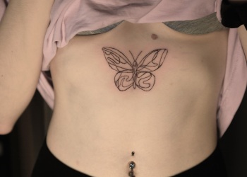 butterlfy-women-chest-tattoo