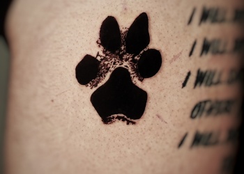 dog-paw-tattoo-on-leg-
