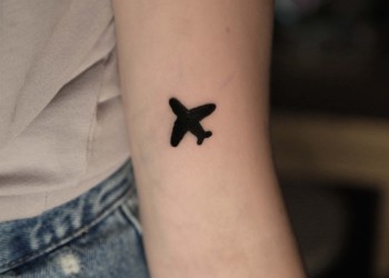woman-arm-tattoo-plane-smallie