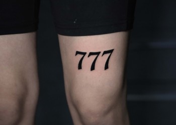 woman-thigh-tattoo-numbers-black